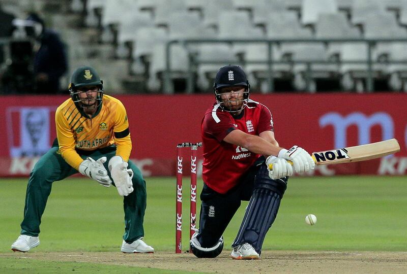 England batsman Jonny Bairstow reverse sweeps the ball during a T20 cricket match between South Africa and England in Cape Town South Africa, Friday, Nov. 27, 2020. (AP Photo/Halden Krog)