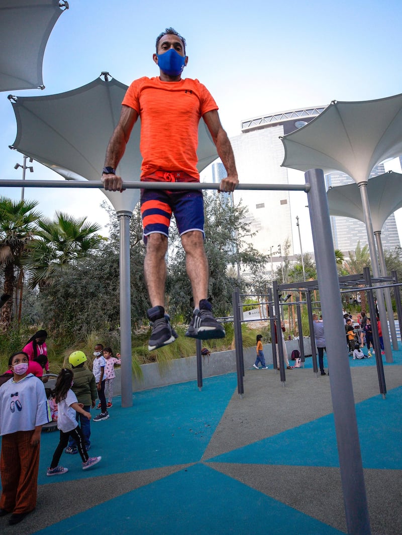 Abu Dhabi, United Arab Emirates, January 21, 2021. Mohammed Ahmed a gymnast from  Lebanon works on the bars in Al Fay Park on Reem Island.
Victor Besa/The National 
Section:  LF
Reporter: Panna Munyal