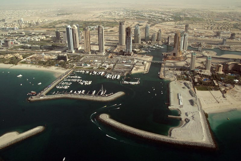 An aerial view taken 29 January 2006 shows Marsa Dubai or Dubai Marina in the Gulf Emirate of Dubai. The marina is the first big project of the world's largest real estate firm in terms of market capitalisation, Emaar Properties. The Dubai-based real estate giant, which has a market capitalisation of more than 40 billion dollars, announced "record annual profits of 4.731 billion dirhams for the year ended December 31, 2005."  AFP PHOTO/NASSER YOUNES (Photo by NASSER YOUNES / AFP)