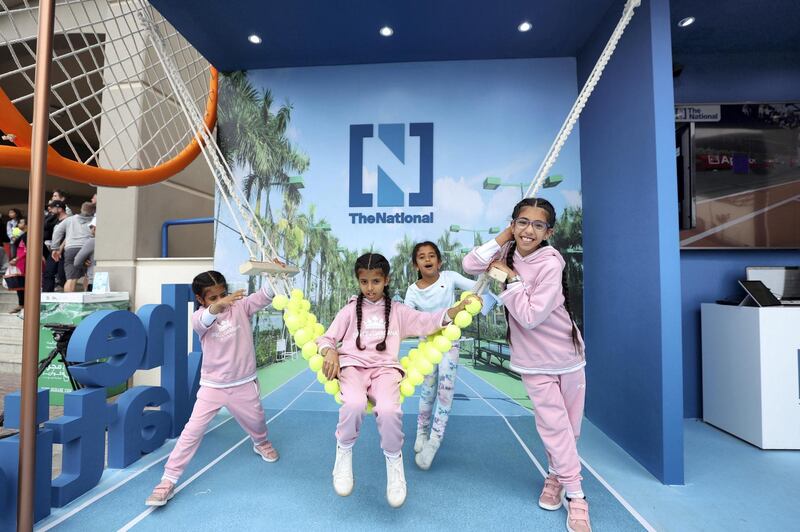 Abu Dhabi, United Arab Emirates - Reporter: Jon Turner: Fans enjoy The Nationals booth during the Mubadala World Tennis Championship. Friday, December 20th, 2019. Zayed Sports City, Abu Dhabi. Chris Whiteoak / The National