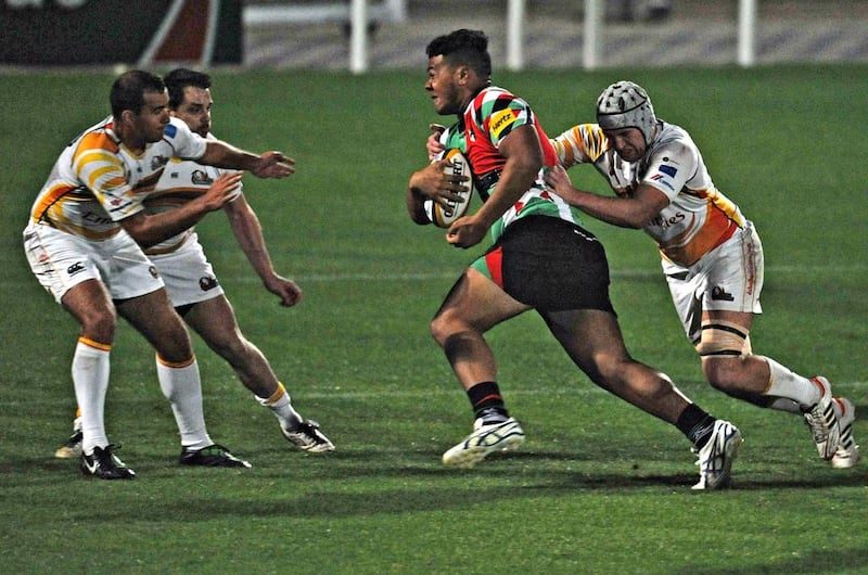 Iziq Foa'i of the Abu Dhabi Harlequins, centre, is being tipped for a professional rugby league career. Jeff Topping / The National