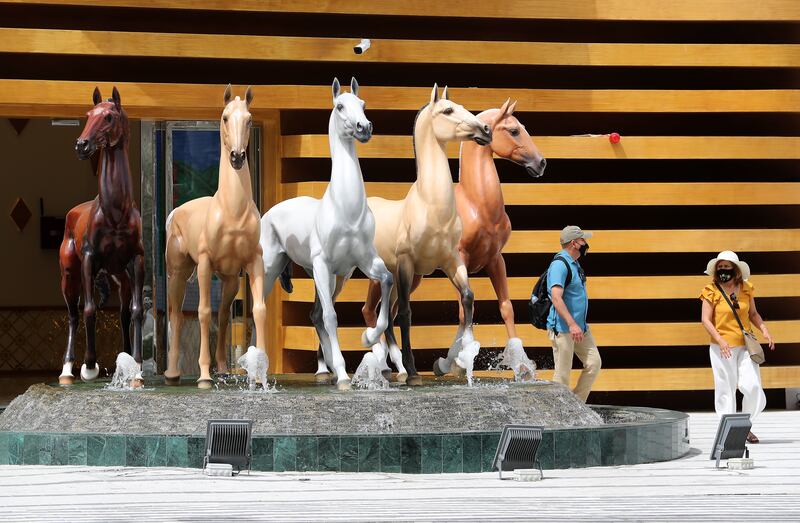 Visitors outside the Turkmenistan pavilion at the EXPO 2020 site in Dubai on 3 October, 2021. Pawan Singh/The National.