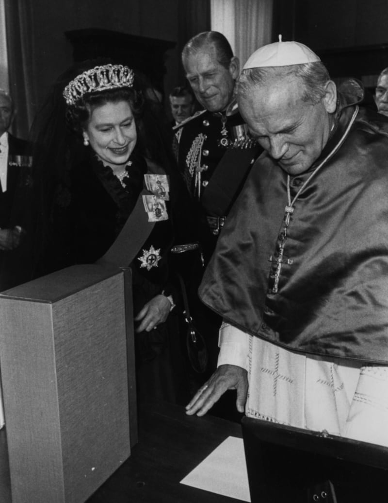 Pope John Paul II with Queen Elizabeth II and the Duke of Edinburgh (centre) during the Royal Tour of Italy, 1980. (Photo by Fox Photos/Hulton Archive/Getty Images)