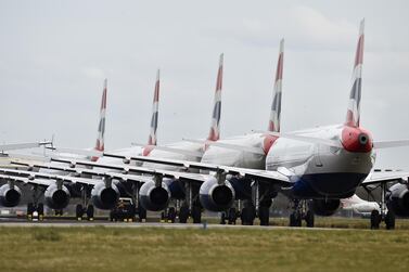 A grounded fleet of British Airway planes sit on the runway at Glasgow Airport. Getty