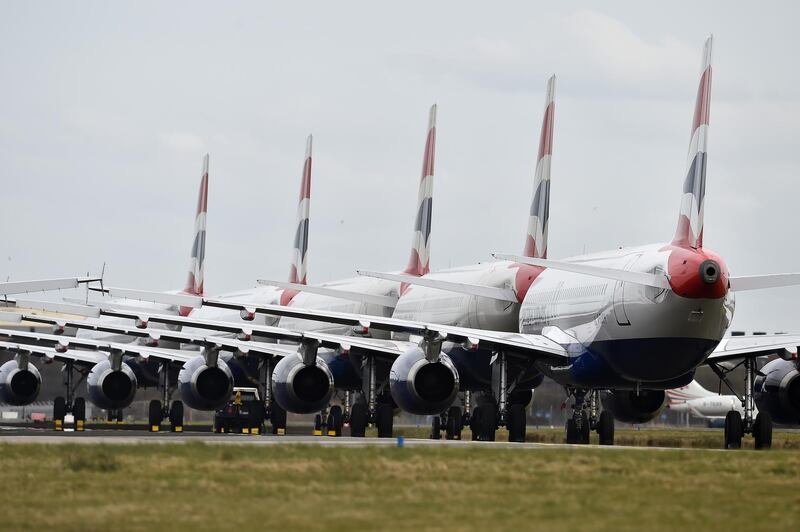 GLASGOW, SCOTLAND - MARCH 21: A grounded fleet of British Airway planes sit on the runway at Glasgow Airport on March 21, 2020 in Glasgow, Scotland. Coronavirus (COVID-19) has spread to at least 186 countries, claiming nearly 12,000 lives and infecting more than 286,000 people. There have now been 3,983 diagnosed cases in the UK and 177 deaths. (Photo by Jeff J Mitchell/Getty Images)