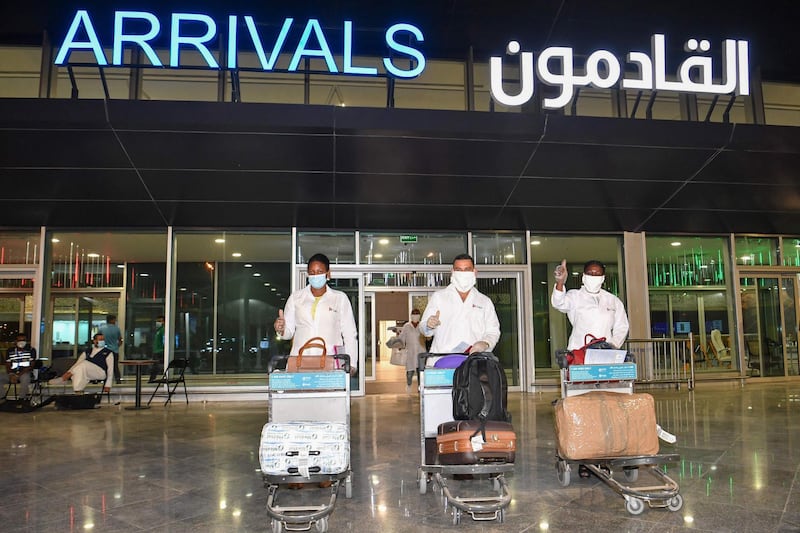 Medical personnel arriving at Kuwait International Airport.  AFP