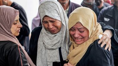 Women mourn their loved ones who were killed overnight in Israeli bombardment of Al Najjar Hospital in Rafah, the southern Gaza Strip. AFP
