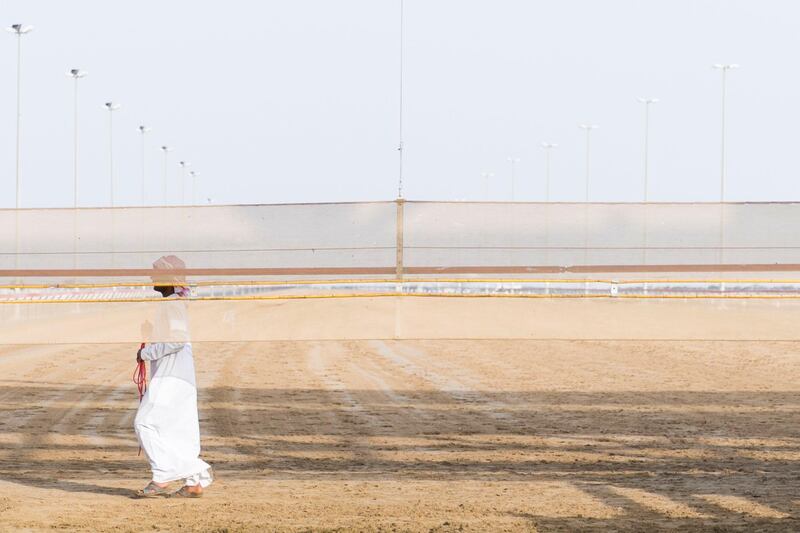 DUBAI, UNITED ARAB EMIRATES - Feb 15, 2018.

A man walks at the start line of Al Marmoum Race Track.

The fastest camels in the Gulf will compete for cash, swords, rifles and luxury vehicles totalling Dh95 million at the first annual Sheikh Hamdan Bin Mohammed Bin Rashid Al Maktoum Camel Race Festival in Dubai.


(Photo: Reem Mohammed/ The National)

Reporter:
Section: NA