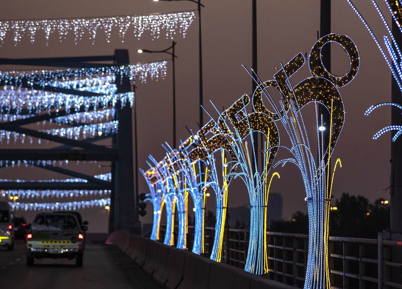 Al Maqta Bridge in Abu Dhabi with UAE at 50 National Day lights. Victor Besa / The National