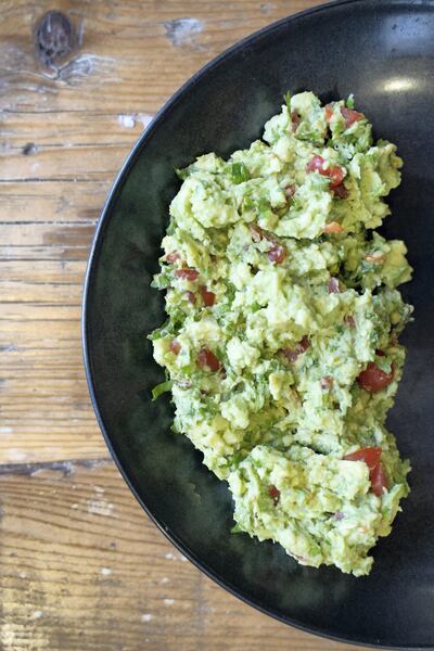 Tomatoes are optional, salt is essential in a good guacamole. Courtesy Scott Price