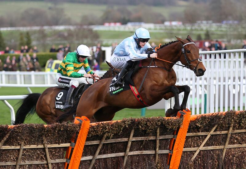 Honeysuckle, ridden by Rachael Blackmore, on the way to winning the Champion Hurdle Challenge Trophy. PA