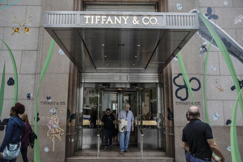 Shoppers exit the Tiffany & Co. store on Fifth Avenue in New York, U.S., on Thursday, May 30, 2019. Tiffany & Co. is scheduled to release earnings figures on June 4. Photographer: Victor J. Blue/Bloomberg