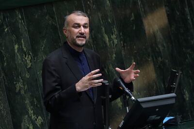 Hossein Amirabollahian speaks during a debate session in parliament on a vote of confidence for President Ebrahim Raisi's nominees for his new cabinet, in Tehran, Iran, Sunday, Aug.  22, 2021.  AP