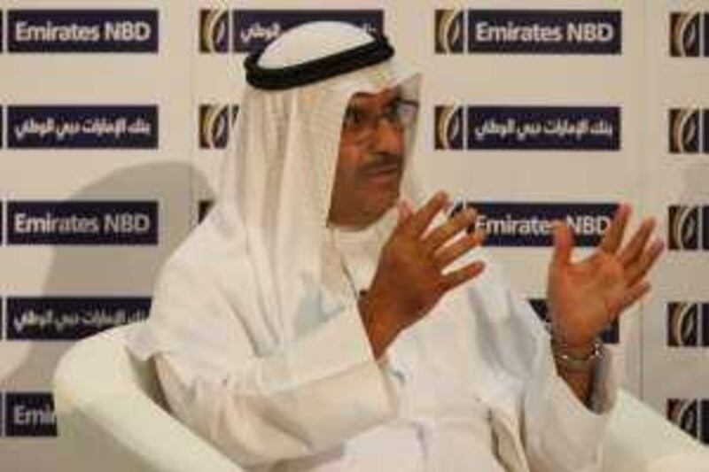 DUBAI - NOVEMBER 21,2009 - H.E Ahmed Humaid Al Tayer, Chairman Emirates NBD gesture during launch of new brand identity at Emirates NBD office in Dubai. ( Paulo Vecina/The National ) *** Local Caption ***  PV NBD 7.jpg