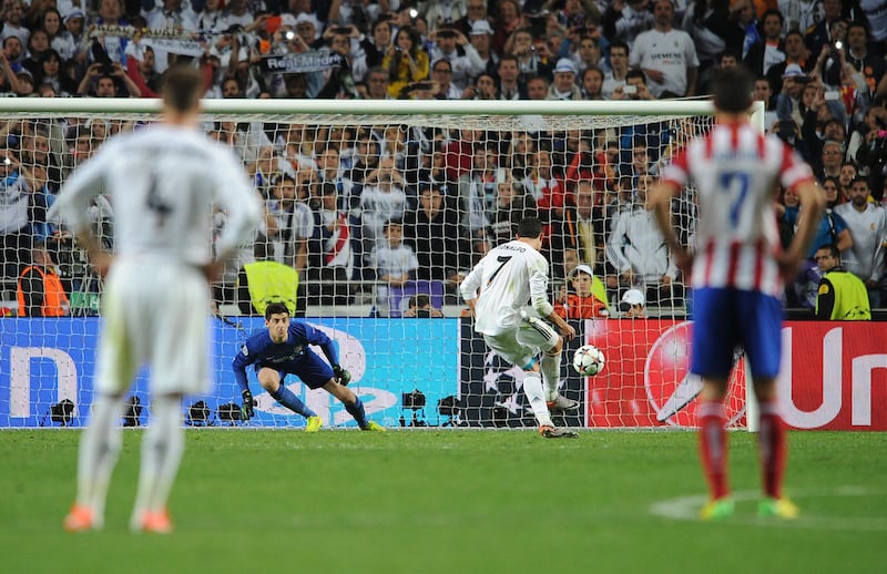 Cristiano Ronaldo of Real Madrid scores his side's fourth goal from the penalty spot (Photo by Chris Brunskill Ltd/Corbis via Getty Images)