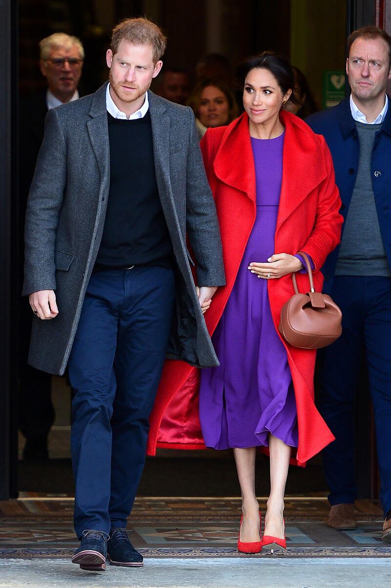 BIRKENHEAD, ENGLAND - JANUARY 14:  Prince Harry, Duke of Sussex and Meghan, Duchess of Sussex depart from Birkenhead Town Hall on January 14, 2019 in Birkenhead, England. (Photo by Richard Martin-Roberts/Getty Images)