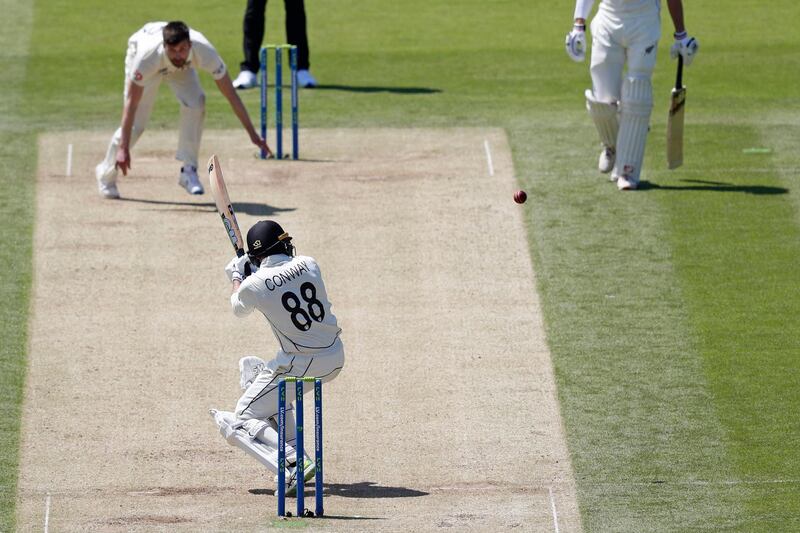 New Zealand batsman Devon Conway plays a shot off the bowling of England's Mark Wood. AFP