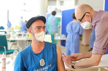  A local resident receives an AstraZeneca vaccine inside the city's main mosque, which has temporarily become a mass vaccination centre in Cologne, Germany. Getty Images