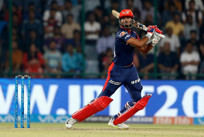 Delhi Daredevils' Shreyas Iyer watches his shot during VIVO IPL cricket T20 match against Kolkata Night Riders in New Delhi, India, Friday, April 27, 2018. (AP Photo/Altaf Qadri)