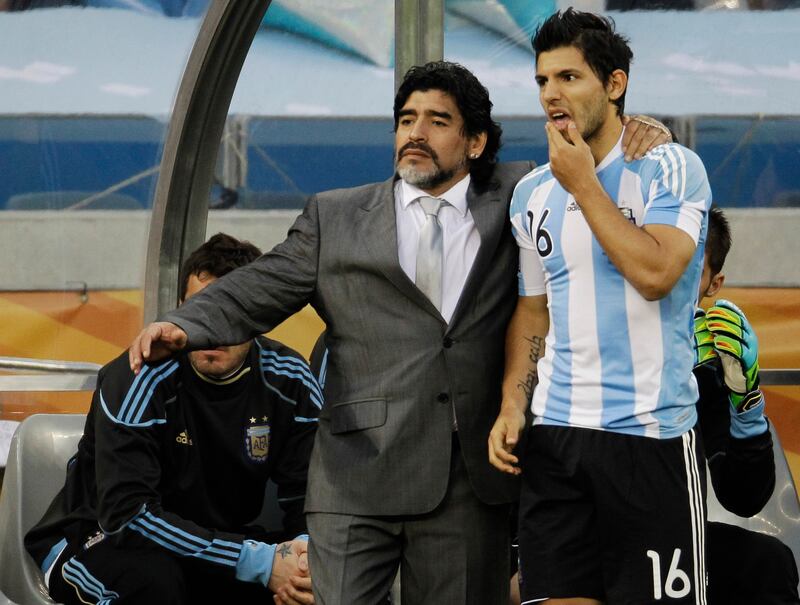 Argentina manager Diego Maradona with Sergio Aguero during the 2010 World Cup quarter-final match against Germany at the Green Point Stadium in Cape Town. AP