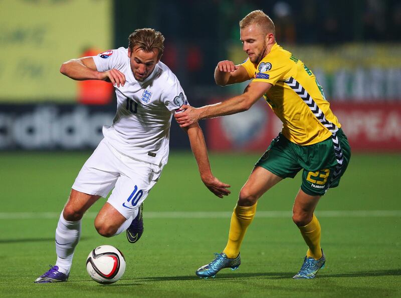 KAUNAS, LITHUANIA - OCTOBER 12:  Harry Kane of England evades Vytautas Andriukevicius of Lithuania during the UEFA EURO 2016 qualifying Group E match between Lithuania and England at LFF Stadionas on October 12, 2015 in Kaunas, Lithuania.  (Photo by Alex Livesey/Getty Images)