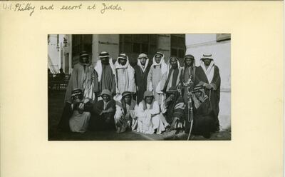 A photograph from 1917 showing British explorer Harry St John Philby (centre, back row) with his Arab entourage on arrival to Jeddah in 1917. The Heart of Arabia expedition retraced Philby's foosteps. Twitter: Mark Evans (@UniOfTheDesert)