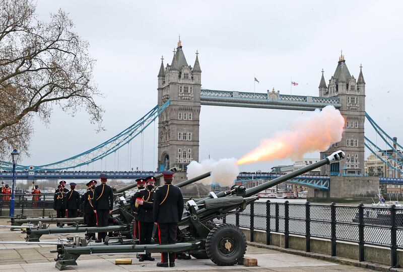 The Honourable Artillery Company fires a gun salute at the Tower of London, with Tower Bridge in the background, to mark the death of Britain's Prince Philip, Duke of Edinburgh, at the age of 99. Getty Images