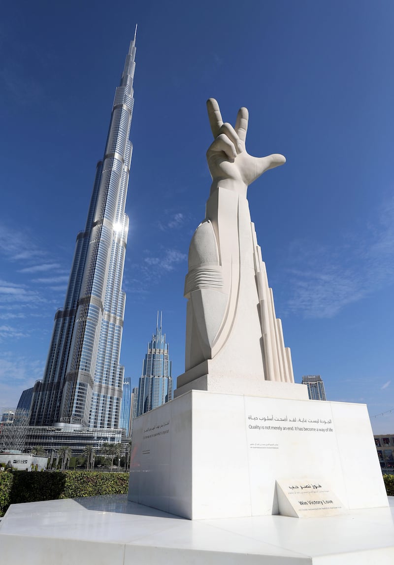 Dubai, United Arab Emirates - November 29, 2020: A sculpture in Burj Park called Win, Victory, Love. Sunday, November 28th, 2020 in Dubai. Chris Whiteoak / The National