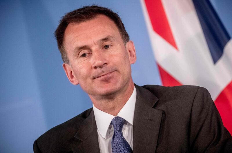 British Foreign Secretary Jeremy Hunt reacts during a joint press conference with his German counterpart, at the Federal Foreign Office in Berlin, on July 23, 2018. German Foreign Minister Heiko Maas hosts British counterpart Jeremy Hunt for first talks after Boris Johnson's resignation. - Germany OUT
 / AFP / dpa / Michael Kappeler
