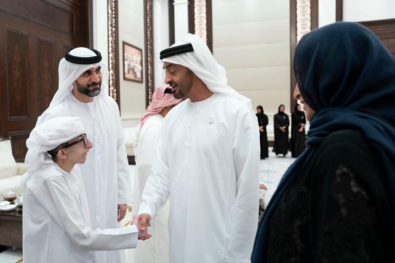 ABU DHABI, UNITED ARAB EMIRATES - May 21, 2019: HH Sheikh Mohamed bin Zayed Al Nahyan, Crown Prince of Abu Dhabi and Deputy Supreme Commander of the UAE Armed Forces (2nd R), receives members of Adheedak group during an iftar reception at Al Bateen Palace.

( Eissa Al Hammadi for the Ministry of Presidential Affairs )
---