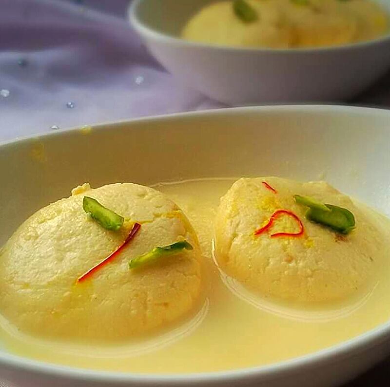 Rasmalai, made from cheese curds, milk, clotted cream and cardamom. 