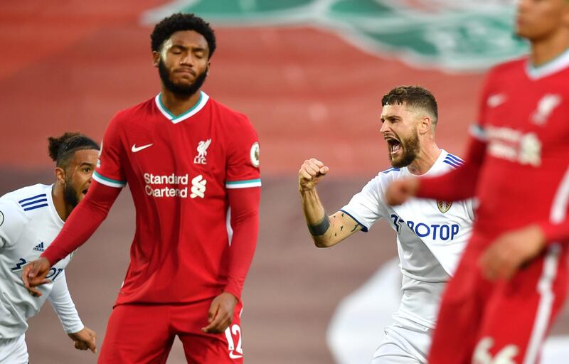 LIVERPOOL, ENGLAND - SEPTEMBER 12: Mateusz Klich of Leeds United celebrates after scoring his team's third goal during the Premier League match between Liverpool and Leeds United at Anfield on September 12, 2020 in Liverpool, England. (Photo by Paul Ellis - Pool/Getty Images)