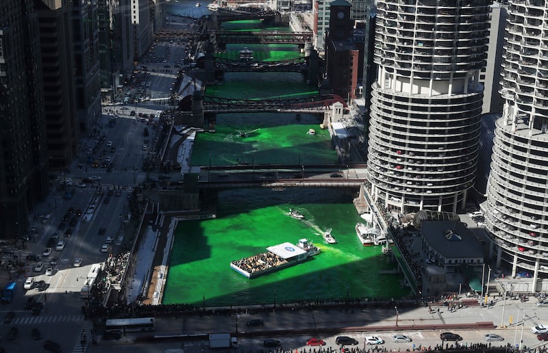 The annual tradition in Chicago stems from 1962, when city workers dumped 100 pounds of dye into the river. AP