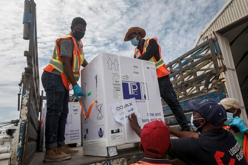 Boxes of Oxford-AstraZeneca Covid-19 vaccines made by the Serum Institute of India and provided through the global Covax initiative arrive at Mogadishu, Somalia. The first shipment of 300,000 doses of the AstraZeneca coronavirus vaccine will be used to inoculate the country's frontline workers, the elderly and those with chronic health conditions. AP