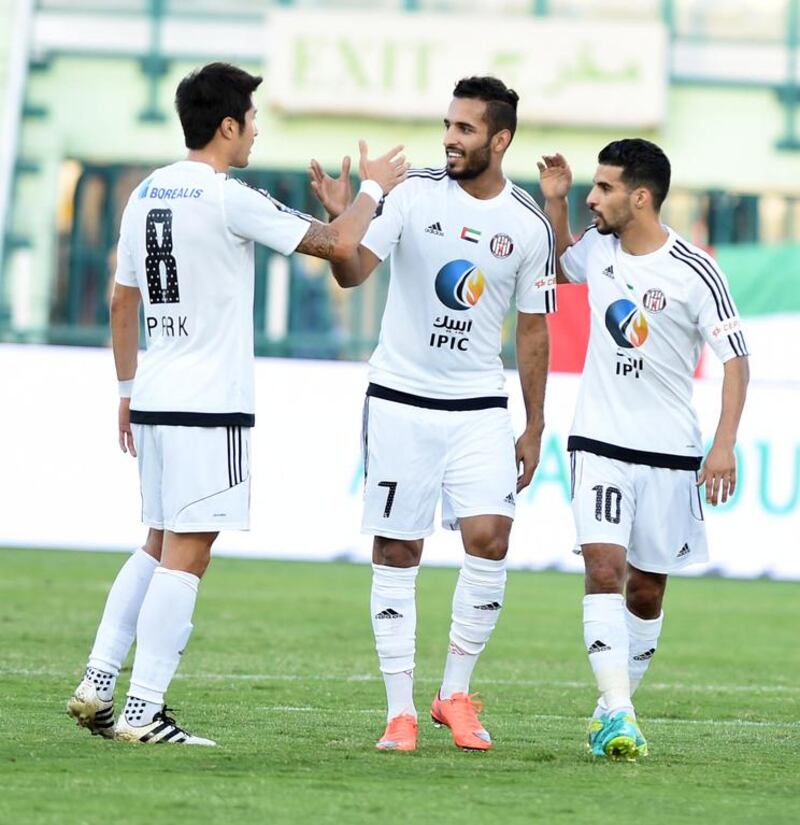 Ali Mabkhout of Al Jazira (centre) celebrates a goal against Al Shabab on December 3, 2016. Photo courtesy Arabian Gulf League