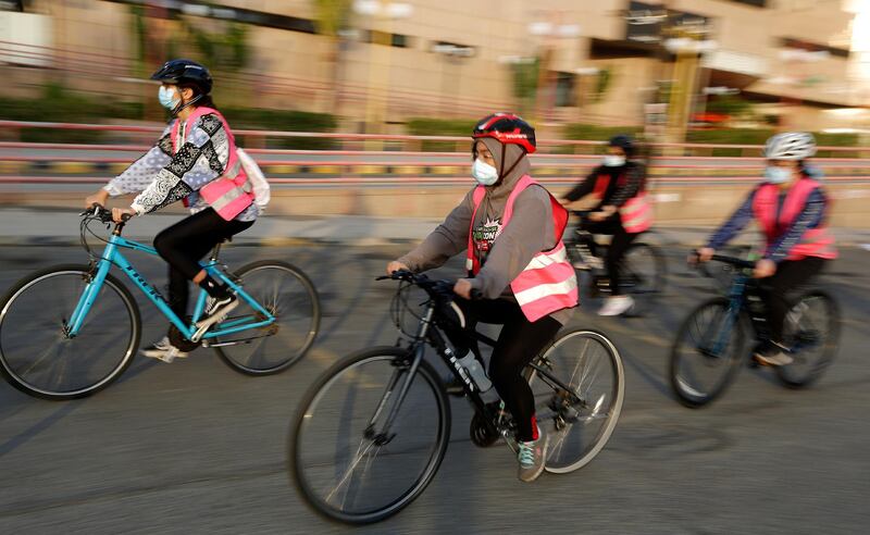 Plenty of colour from members of the Brave women's cycling team ride on the road in Jeddah. AP