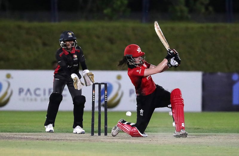 Mariko Hill of Hong Kong plays a shot.