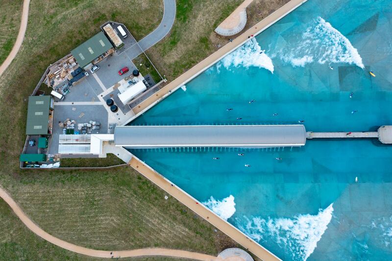 An aerial view of the Wave inland surfing centre in Bristol which has reopened. People can now take part in formal organised outdoor sports with any number of people. Getty Images