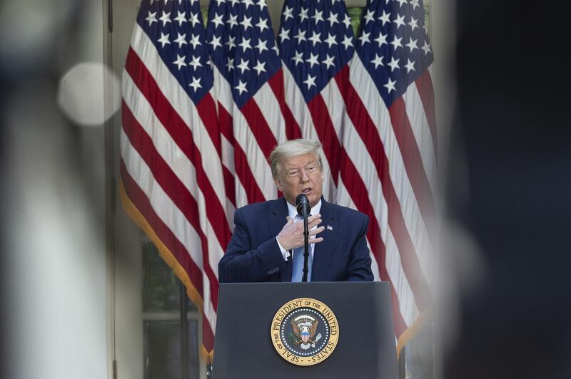 U.S. President Donald Trump speaks during a Presidential Recognition Ceremony in the Rose Garden of the White House in Washington, D.C., U.S., on Friday, May 15, 2020. Trump has complained from the start of his presidency that Barack Obama and anti-Trump factions in the Justice Department and U.S. intelligence agencies misused their power to undermine him -- a conspiracy theory that's not backed by evidence. Photographer: Stefani Reynolds/CNP/Bloomberg