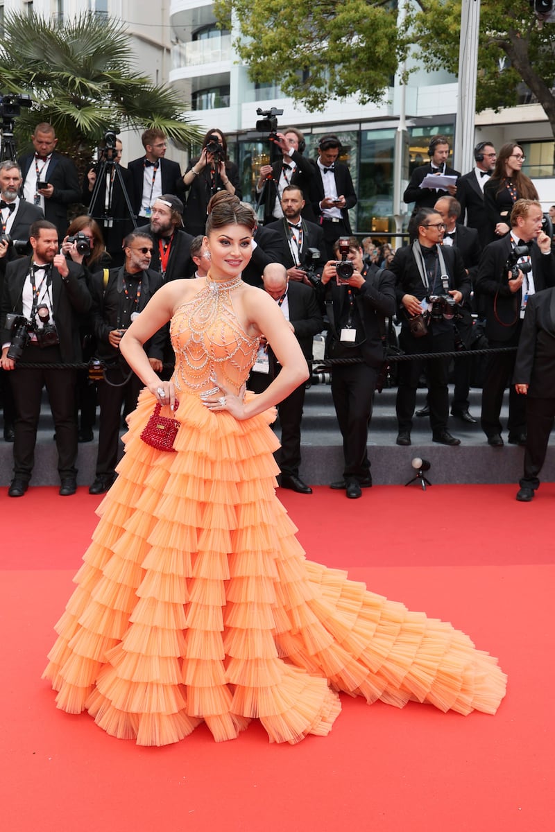 In tiered peach ruffles, Urvashi Rautela attends the screening of Monster at Cannes Film Festival. Getty Images