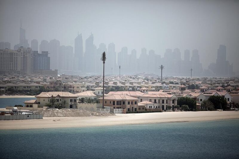 Oil is a vital indicator for the economic health of countries in the GCC. Pictured, Dubai's Palm Jumeirah. Silvia Razgova / The National