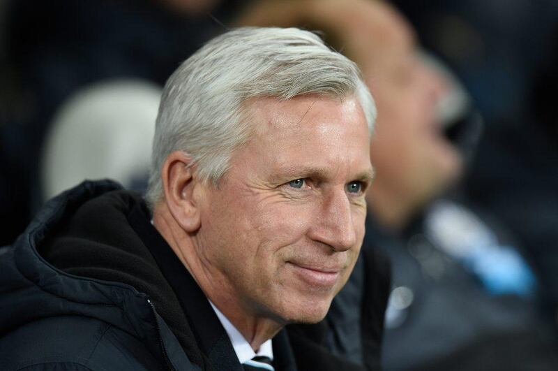 Newcastle United manager Alan Pardew observes his side during their 3-2 Premier League win over Everton on Sunday. The club announced on Monday he had permission to begin talks with Crystal Palace about taking their open managerial position. Stu Forster / Getty Images / December 28, 2014
