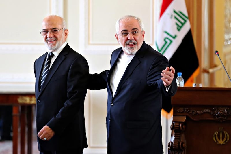 Iraqi foreign minister Ibrahim Al Jaafari, left, and his Iranian counterpart, Mohammad Javad Zarif, in Tehran on January 6, 2015. AFP