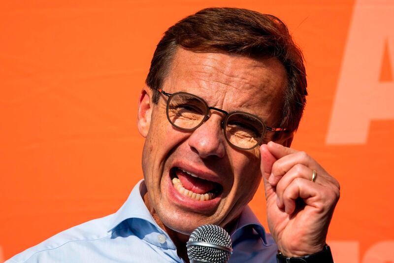 Ulf Kristersson, leader of the Moderate Party in Sweden, speaks at a rally of the Alliansen and all its leaders in Stockholm on September 8, 2018, as part of the election campaign before the September 9 general election. - The alliance consists of the Moderate Party, the Centre Party, Liberals and Christian Democrats. Sweden holds legislative elections on Sunday, September 9, 2018, with polls predicting a parliamentary deadlock as neither Prime Minister Stefan Lofven's left-wing bloc nor the opposition centre-right are seen winning a majority, while the far-right makes gains. (Photo by Jonathan NACKSTRAND / AFP)