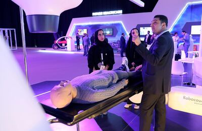  DUBAI , UNITED ARAB EMIRATES , JAN 15 – 2018 :- Eng. Chadi Mishlawi , Facility Manager , Neuro Spinal Hospital explaining about the CyberKnife Accuray machine to the visitors during the Dubai Health Forum held at Madinat Jumeirah in Dubai.  (Pawan Singh / The National) For News. Story by Nick Webster 