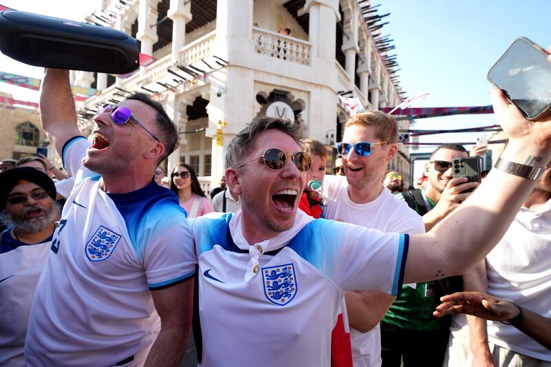 England fans in the Souq area of Doha. PA