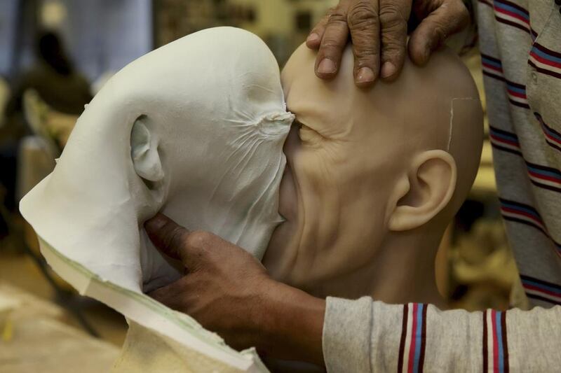 The figure is prepared ahead of the opening of the new Grevin Wax Museum in Prague on May 1st. Philippe Wojazer / Reuters 
