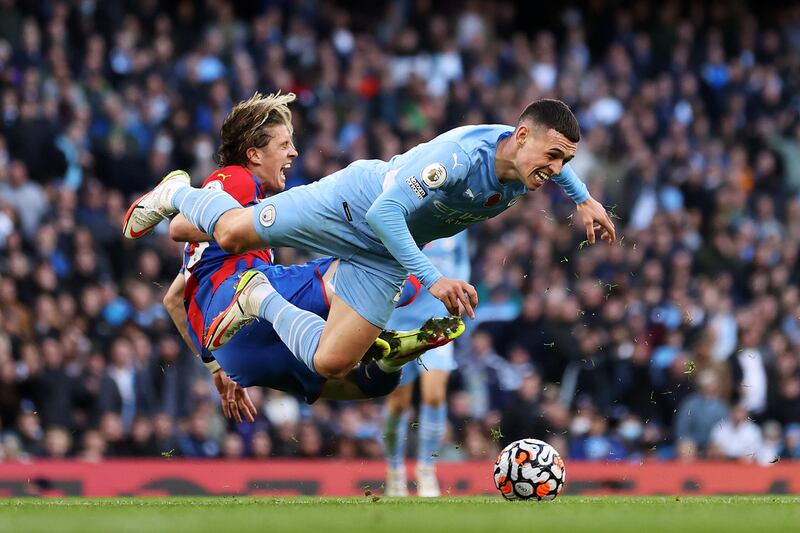 Conor Gallagher of Crystal Palace collides with Phil Foden of Manchester City at the Etihad Stadium. 30/10/2021. Naomi Baker / FPA / LDY Agency