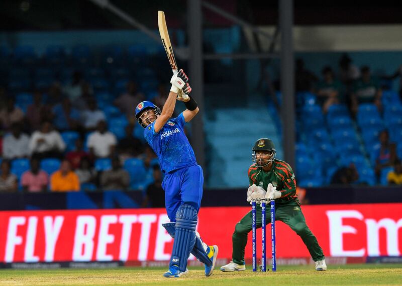 Afghanistan's Rahmanullah Gurbaz hits a six during the T20 World Cup match against Bangladesh. AFP