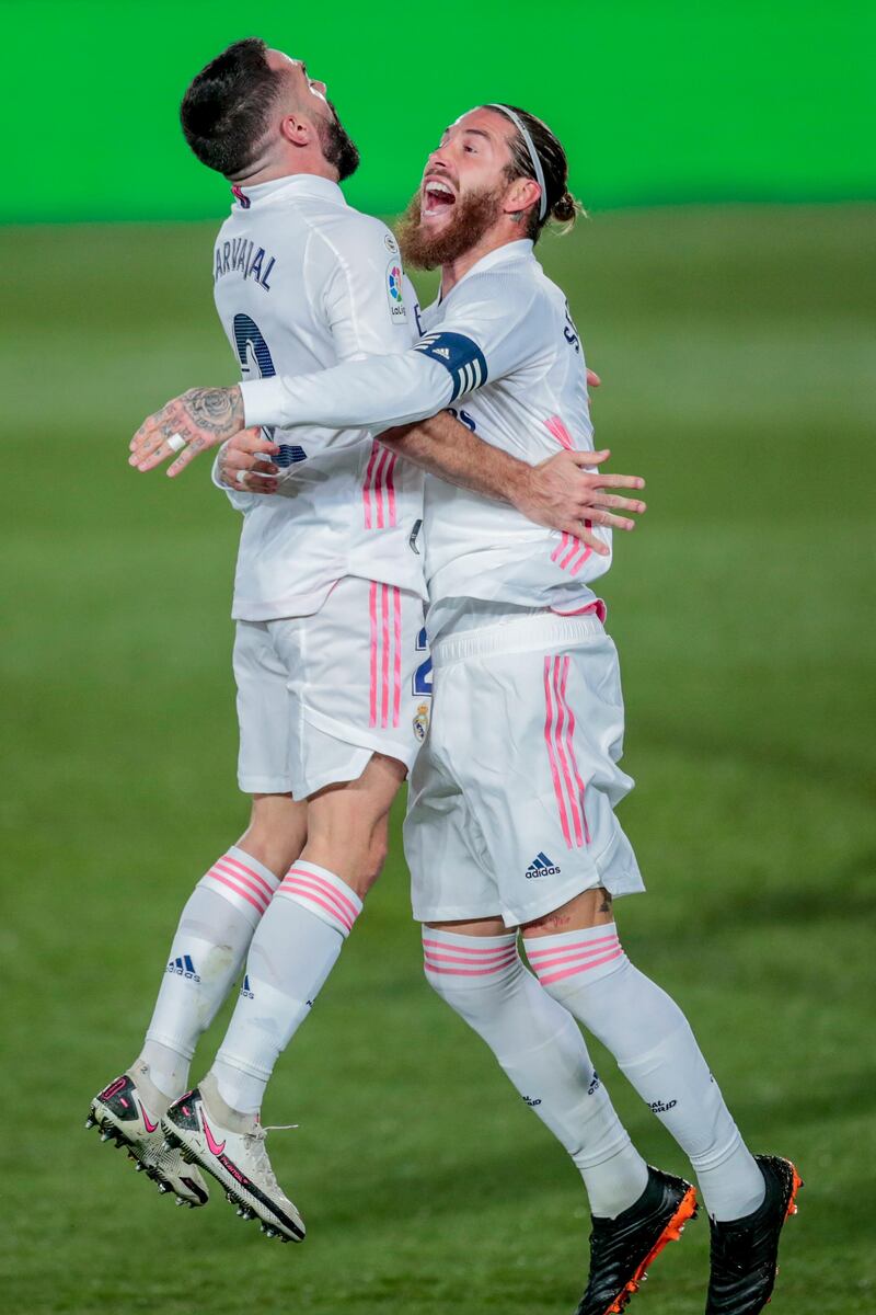 Real Dani Carvajal, left, celebrates the second goal. AP